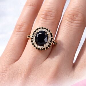 Elegant Black and Gold Ring